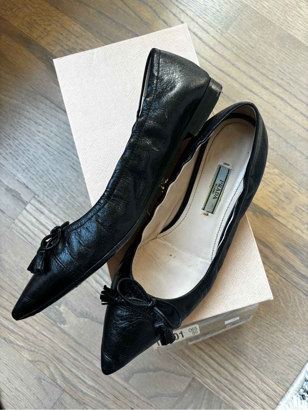 Prada Pointed Toe Tassel Bow Flats